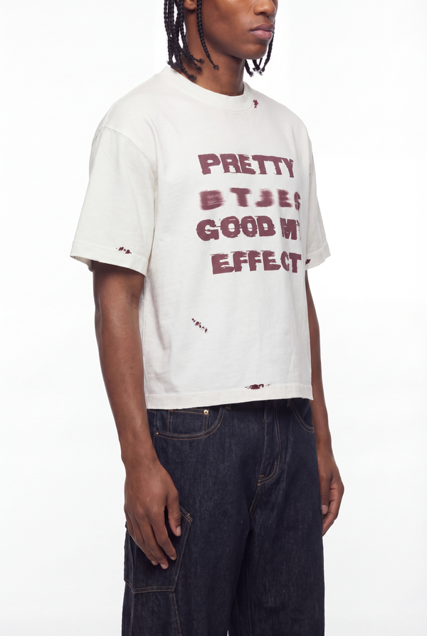 Distressed off-white cropped tee